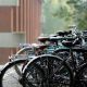 An image of a row of bikes on the University of Sussex Campus